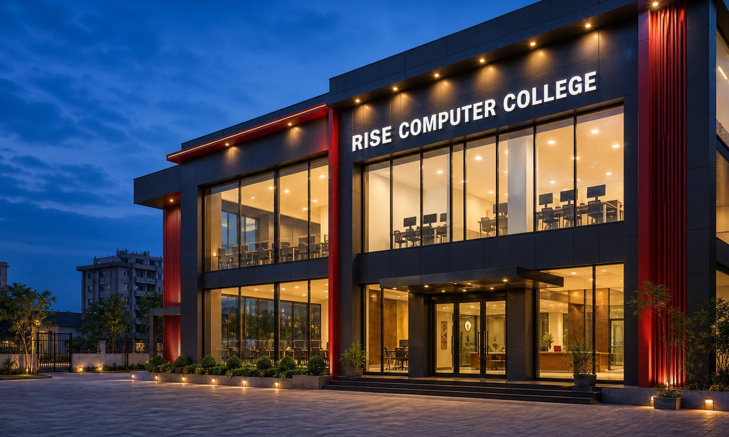 Modern Rise Computer College building illuminated at evening